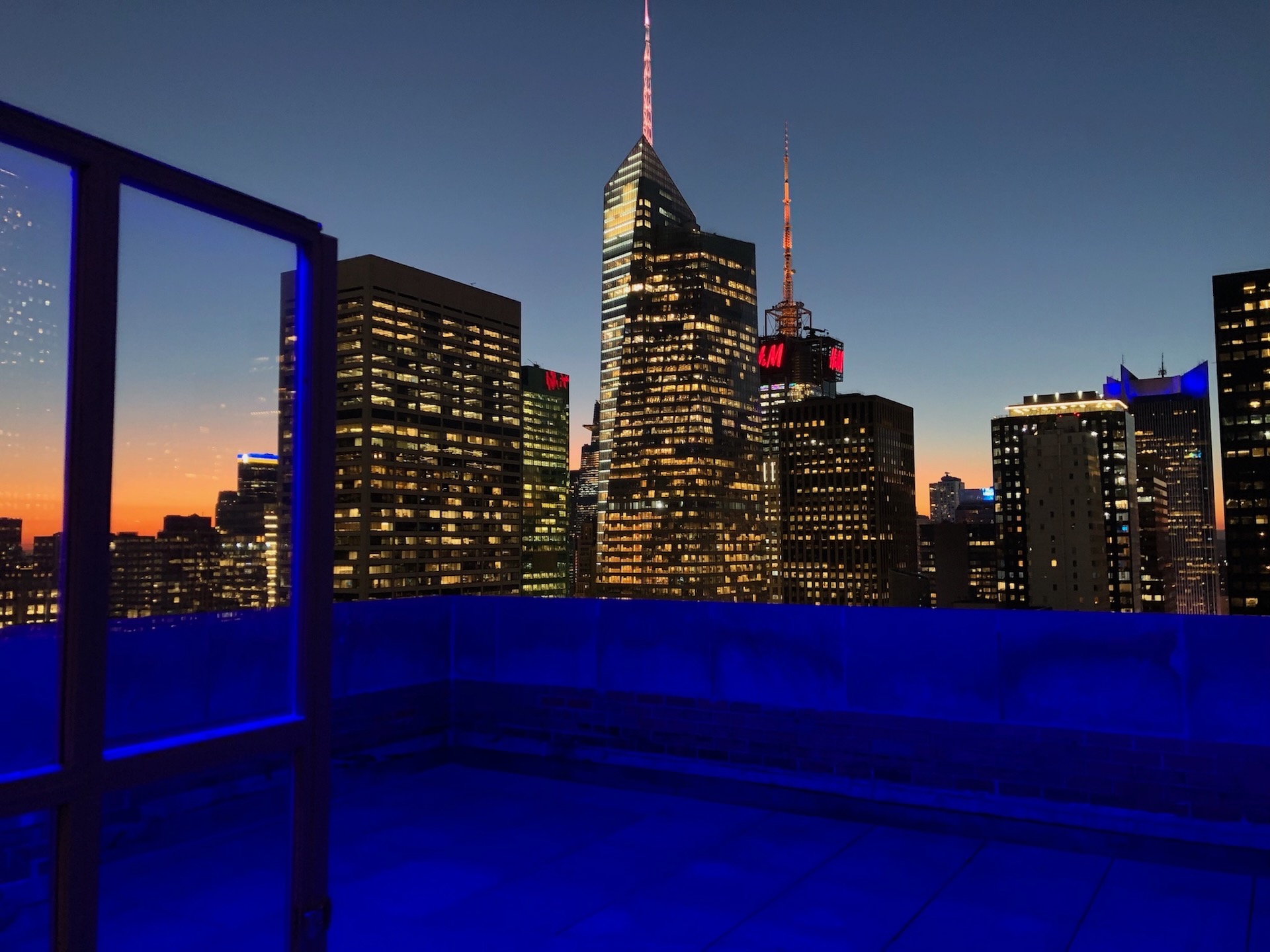 The terrace at blue hour, Midtown in full view.