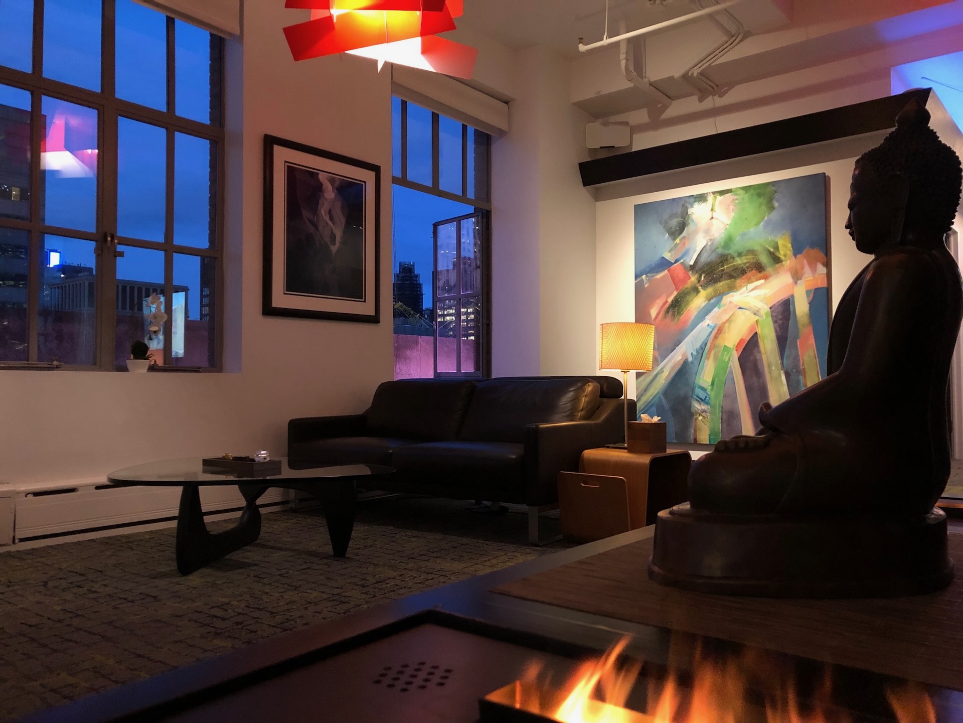 The lounge at dusk — warm, quiet, unhurried.